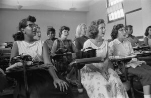 A black and white photograph from the mid-1950's of a desegregated classroom in Washington, D.C.