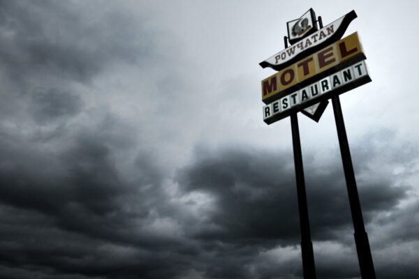 Photograph of sign reading Powhatan Motel and Restaurant.