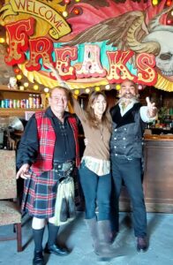Stephanie, Pexcho, and an unidentified man at the American Dime Museum.